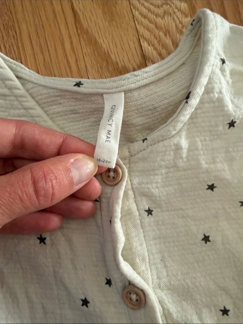 Quincy Mae Cream Romper with Black Star Print 18-24Mo